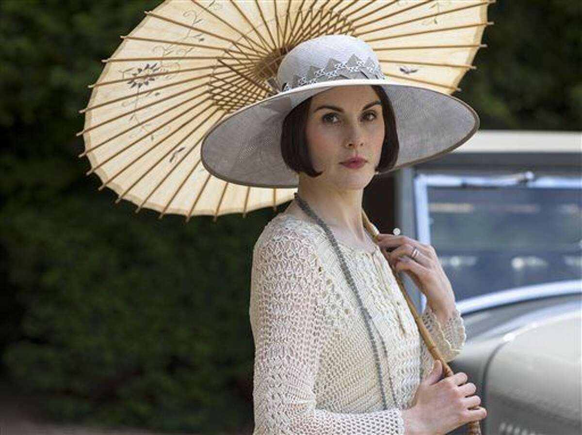 This image released by PBS shows Michelle Dockery as Lady Mary in a scene from the final season of "Downton Abbey." The series finale airs in the U.S. on Sunday. (Nick Briggs/Carnival Film & Television Limited 2015 for MASTERPIECE via AP)
