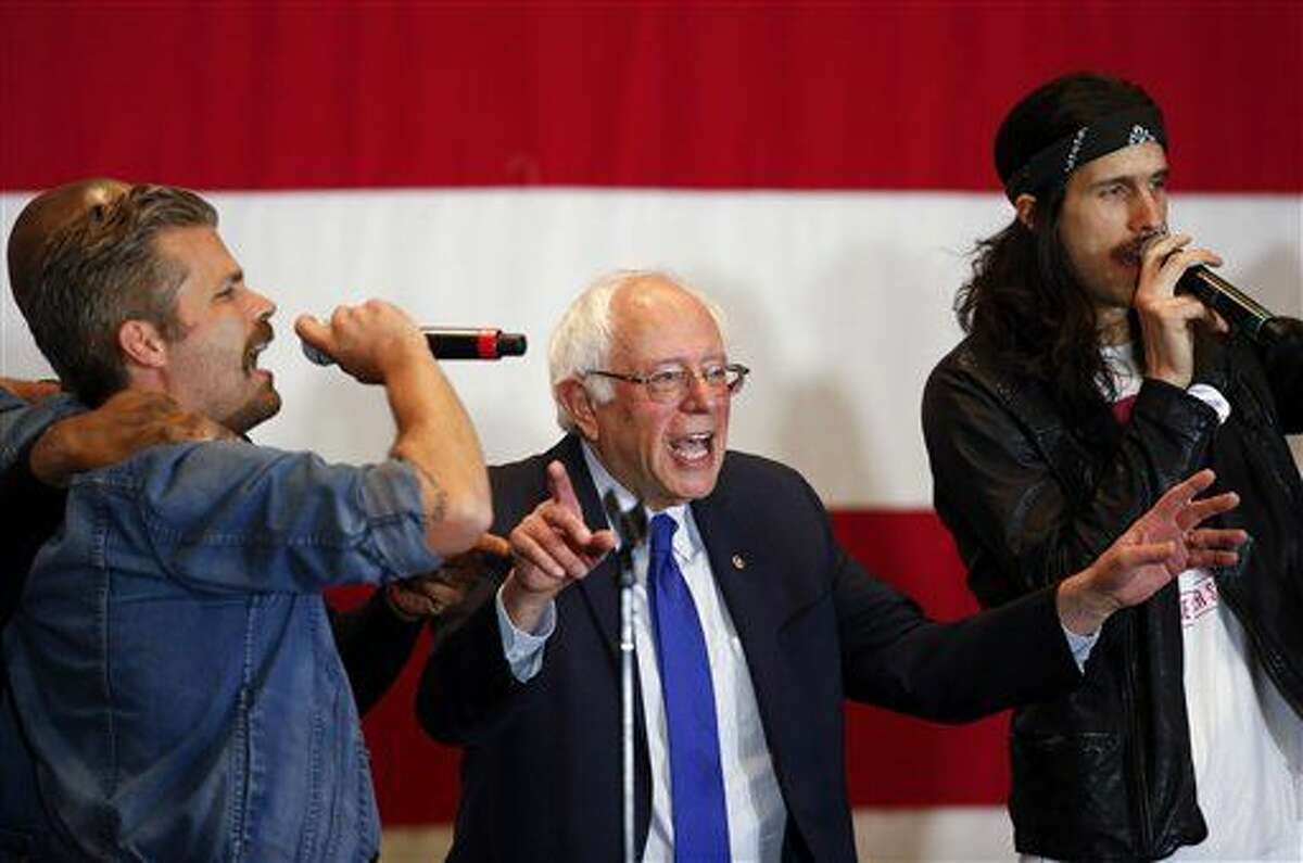 Democratic presidential candidate Sen. Bernie Sanders, I-Vt., sings during a campaign event, Monday in Milwaukee. 