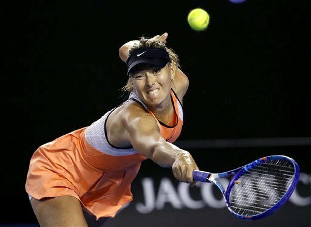 FILE - In this Jan. 20, 2016, file photo, Maria Sharapova of Russia reaches for a backhand return to Aliaksandra Sasnovich of Belarus during their second round match at the Australian Open tennis championships in Melbourne, Australia. Sharapova has called a news conference to make what her agent calls a “major announcement.” The news conference is scheduled for Monday, March 7, in Los Angeles. (AP Photo/Vincent Thian, File)