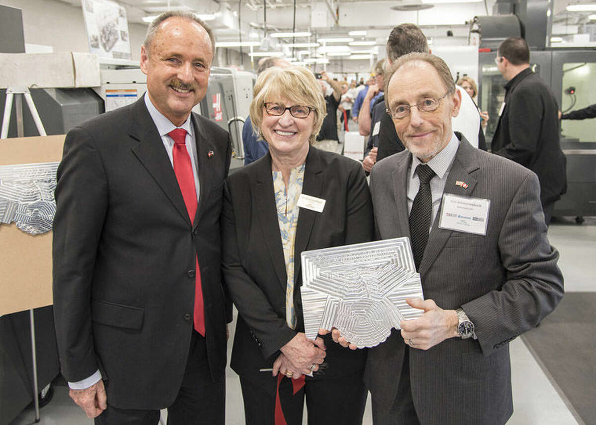Delta College President Jean Goodnow, center, is joined by André Schaller, Swiss Consul General of New York, and Rollomatic representative Eric Schwarzenbach during a recent event at Delta College that celebrated developments surrounding the schools’ new state-of-the art CNC Machine Tool Lab. The upgraded facility features $1.2 million in new equipment along with four machines with a value of $1 million that have been entrusted to Delta for use in its CNC program by major companies Hass and Rollomatic.
