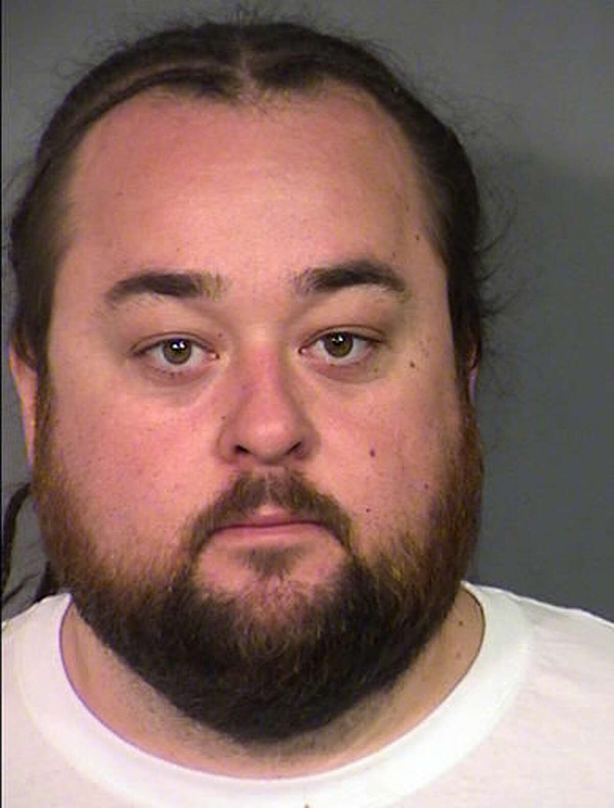 This Clark County Detention Center photo, provided by the Las Vegas Metropolitan Police Department, shows Austin Lee Russell, 33, of Las Vegas, on Wednesday, March 9, 2016. Russell is known as Chumlee to viewers of the reality cable TV show "Pawn Stars." Russell was being held in a Las Vegas jail late Wednesday, following his arrest on weapon and multiple drug charges, after officers serving a warrant at his home in a sexual assault investigation found methamphetamine, marijuana and at least one gun. (Las Vegas Metropolitan Police Department via AP)