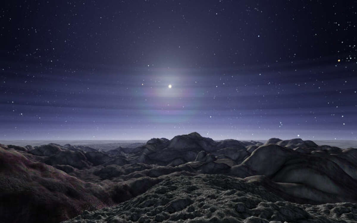The surface of Pluto is seen at sunrise in this photo from the new full-dome production called “Edge of Darkness,” which will premiere at the Delta College Planetarium on Saturday at 3:30 p.m.