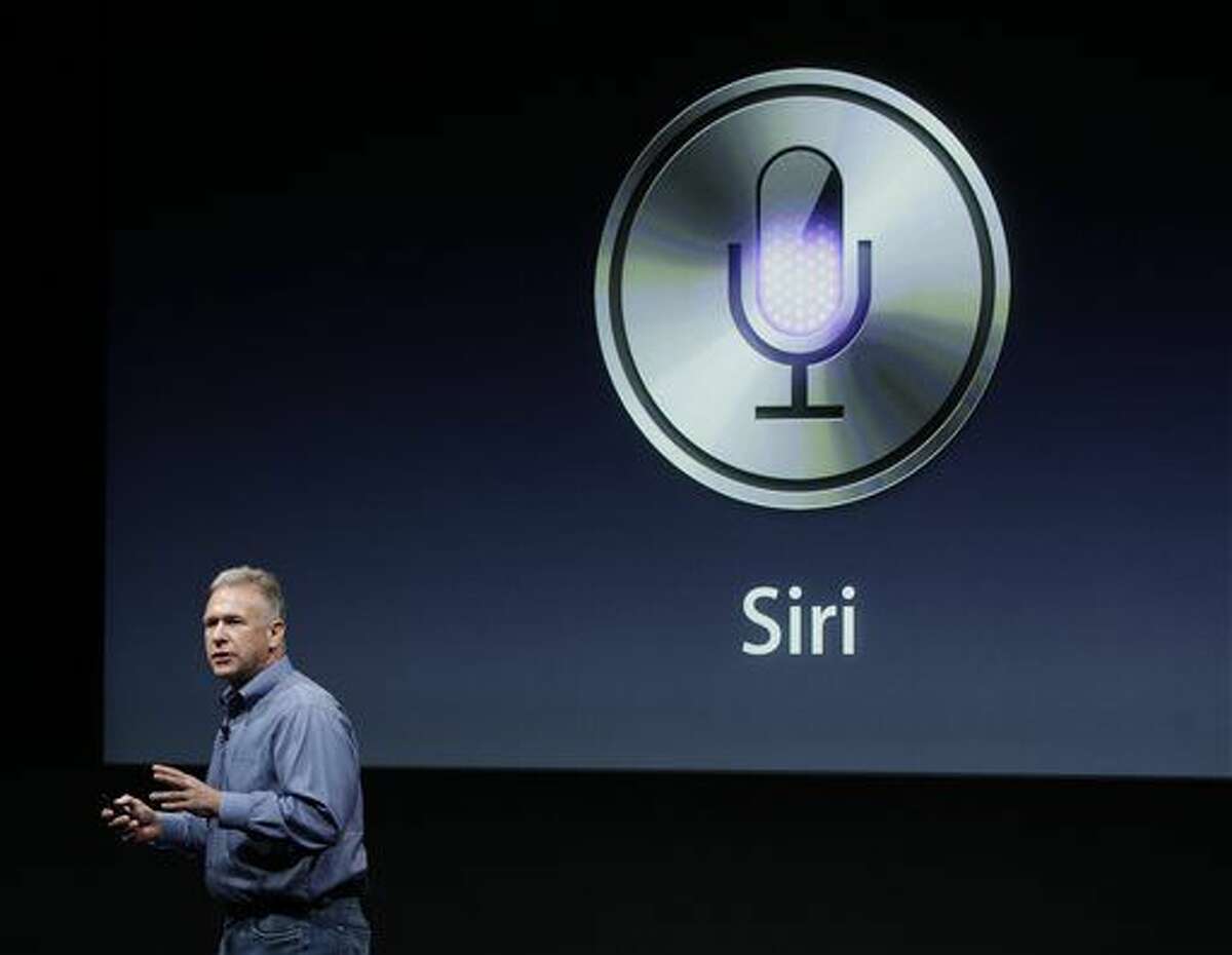 In this AP file photo, Apple's Phil Schiller talks about Siri during an announcement at Apple headquarters in Cupertino, Calif. Apple’s Siri made a big splash when the wisecracking digital assistant debuted in 2011. On Monday, Apple is expected to demonstrate how much smarter Siri can get as it kicks off its annual software conference.