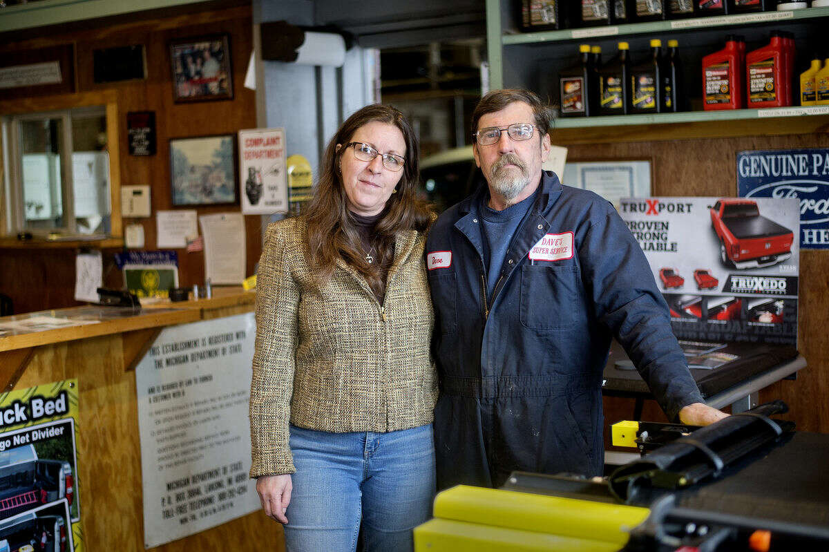 Dave Sweeny, right, and his wife, Gwen, are shown inside of Dave's Super Service in Coleman.