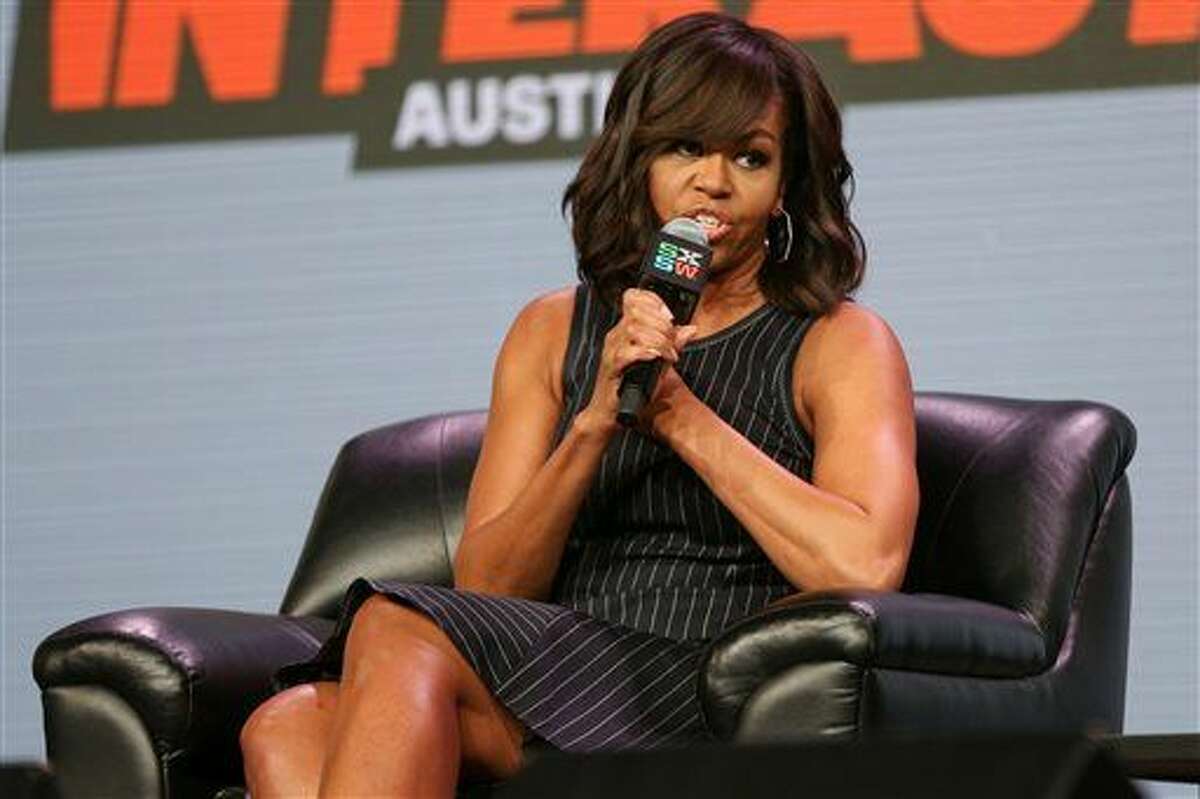 First lady Michelle Obama speaks at a panel discussion during South By Southwest at the Austin Convention Center on Wednesday, March 16, 2016, in Austin, Texas. (Photo by Rich Fury/Invision/AP)