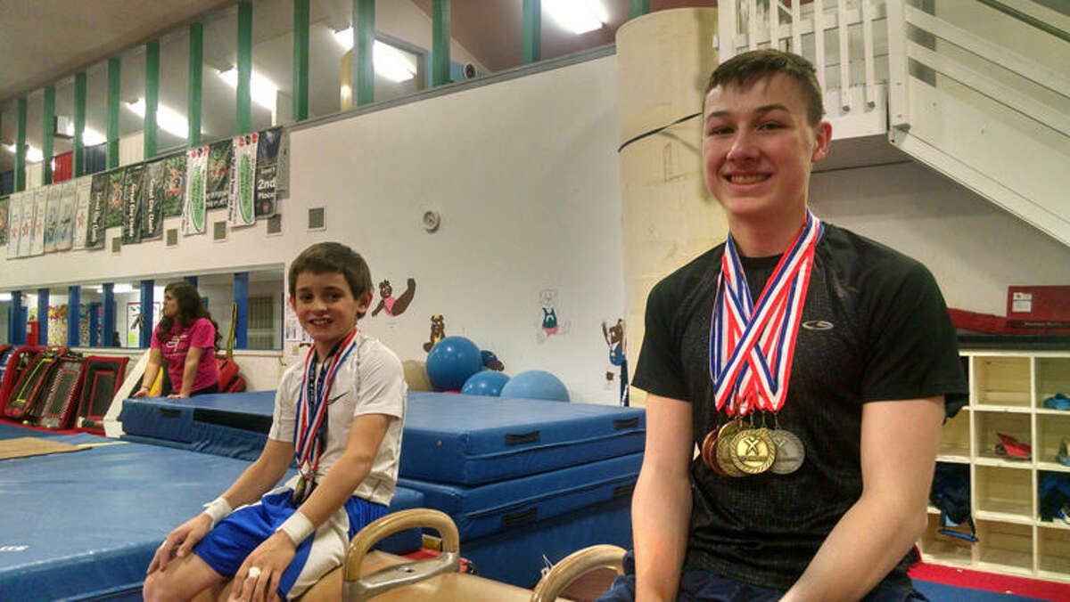 Midland’s Carson Clark (right) of the Midland Gymnastics Training Center recently won Level 8 state championships on floor exercise, pommel horse, rings, and vault and finished second in the state all-around, while Sanford’s Bode Ellis-Meylan (left) won a Level 4 state championship on parallel bars.