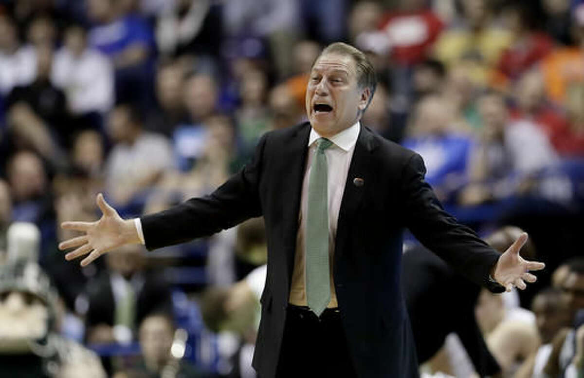 Michigan State head coach Tom Izzo talks to his players during the first half of a first-round men's college basketball game against Middle Tennessee in the NCAA Tournament, Friday, March 18, 2016, in St. Louis. (AP Photo/Charlie Riedel)