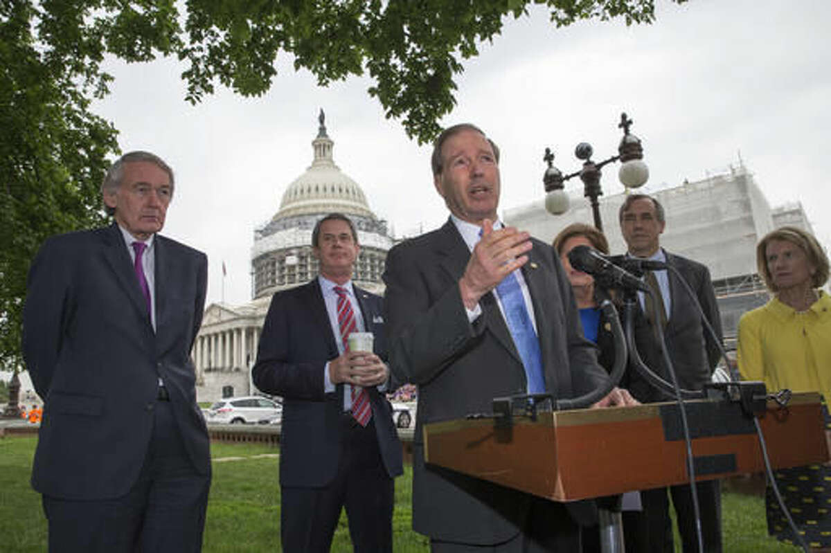 Sen. Tom Udall, D-N.M., center, joined by, from left, Sen. Edward J. Markey, D-Mass., Sen. David Vitter, R-La., Bonnie Lautenberg, widow of the late New Jersey Sen. Frank Lautenberg, Sen. Jeff Merkley, D-Ore., and Sen. Shelley Moore Capito R-W. Va., talks about bipartisan legislation to improve the federal regulation of chemicals and toxic substances, Thursday, May 19, 2016 during a news conference on Capitol Hill in Washington. Sen. Udall is the sponsor of the bill which was initiated by Sen. Frank Lautenberg.