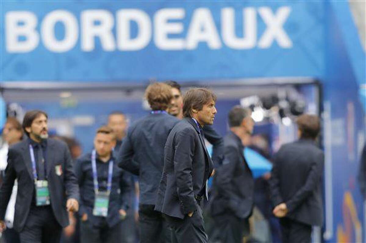 Italy coach Antonio Conte attends a walk around session at the Nouveau Stade in Bordeaux, France, Friday, July 1, 2016. Italy will face Germany in a Euro 2016 quarter final soccer match in Bordeaux on Saturday, July 2, 2016. (AP Photo/Antonio Calanni)