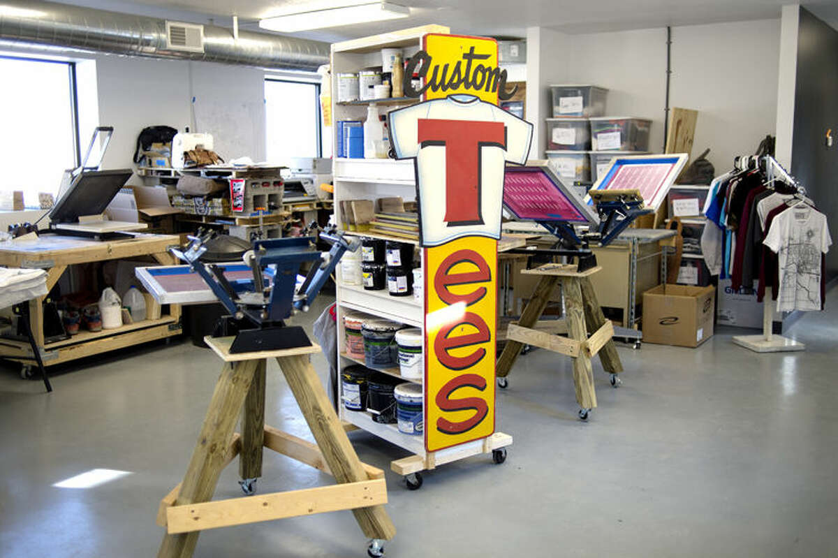 Red Threads Custom Screen Printing's work space in Midland. Josiah Blackmore is the founder and CEO.