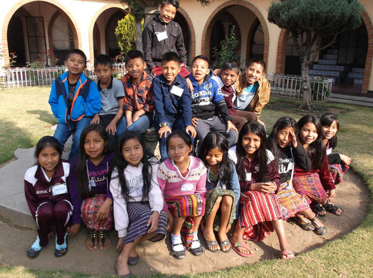 During a recent field trip, eager fifth graders anticipate another day of seeing educational and historical sites in Quetzaltenango, Guatemala’s second largest city.