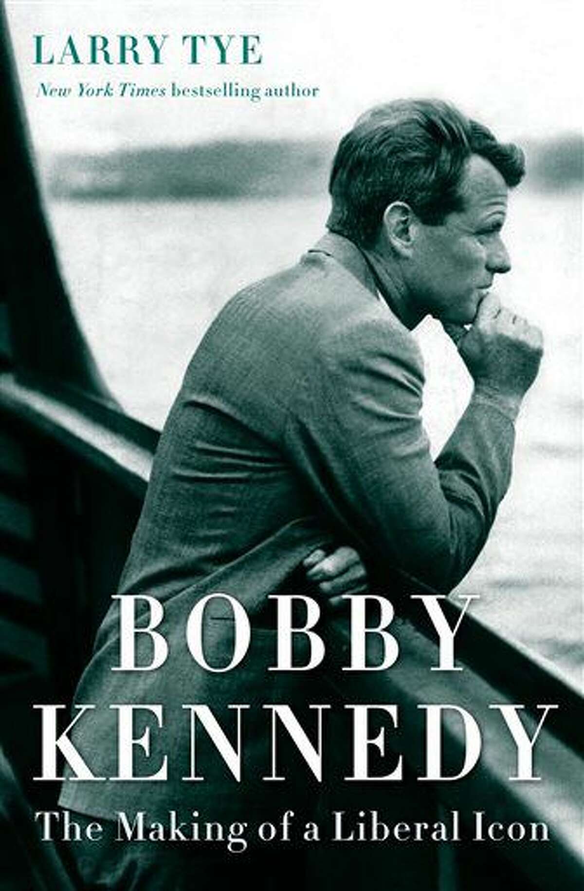 This book cover image released by Random House shows, "Bobby Kennedy: The Making of a Liberal Icon," by Larry Tye. (Random House via AP)