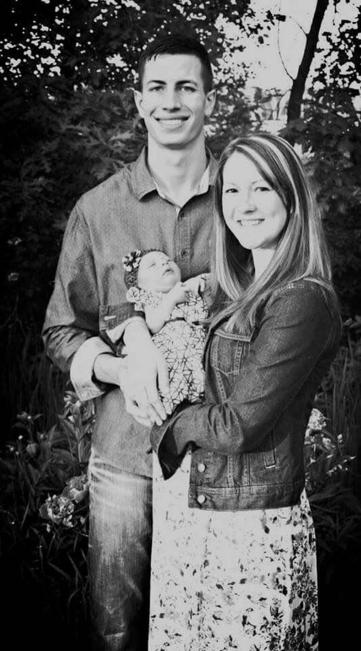 Dr. Ryan Balzer is opening ADIO Chiropractic at 301 E. Wackerly St. in the Bell Plaza. Balzer is shown with his wife, Elizabeth, and their newborn daughter, Olivia. The practice will treat the entire family.