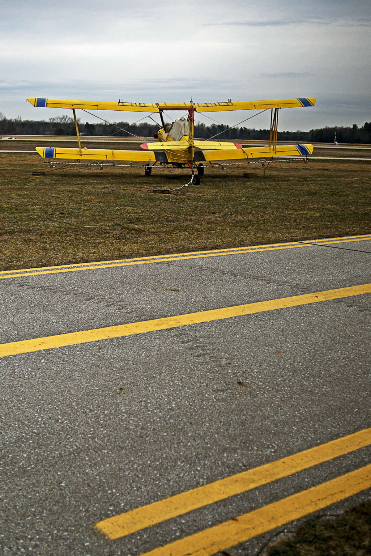 FILE - A plane waits to be tested for calibration before taking off to distribute mosquito larvicide treatment in this Daily News file photo.