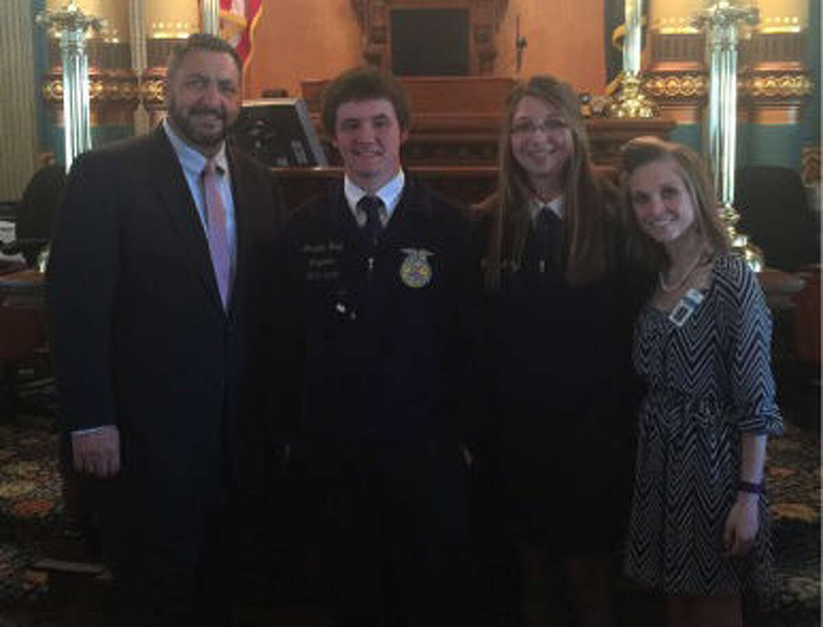 Pictured are Marie Zwemmer, Makayla Ogg and Brandon Hoag with Sen. Jim Stamas.
