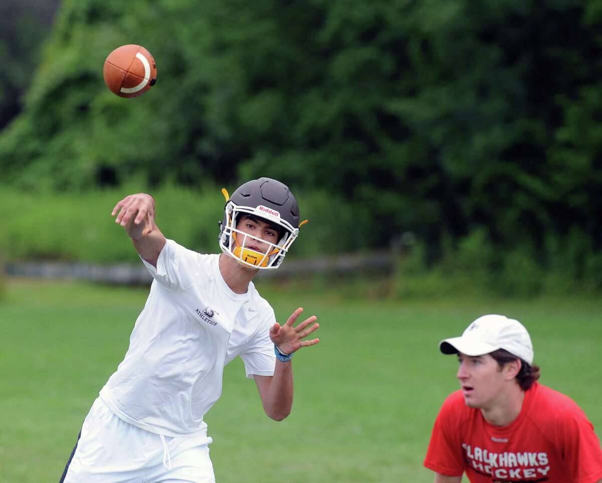 Brunswick School quarterback Nick Henkel throws during the annual Grip It & Rip It 7-on-7 football tournament at New Canaan High School on Saturday.