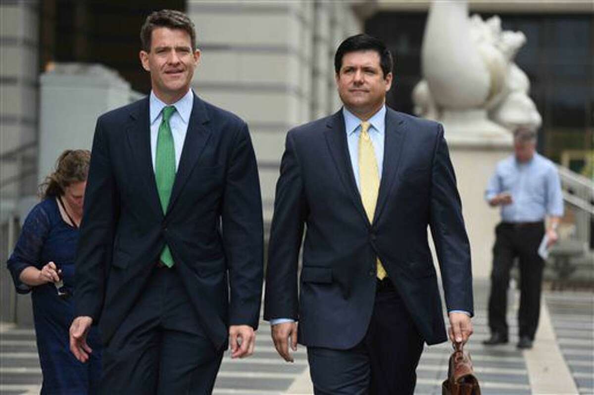 Bill Baroni, left, and his attorney, Michael Baldassare, leave U.S. District Court in Newark, N.J. on Thursday, July 7, 2016. U.S. District Judge Susan Wigenton granted a motion by the law firm representing Christie's office to quash a subpoena by Bill Baroni and Bridget Kelly, who face trial in the fall on charges they conspired to close lanes to create traffic jams in 2013 to punish a Democratic mayor for not endorsing Christie. (Amy Newman/The Record of Bergen County via AP)