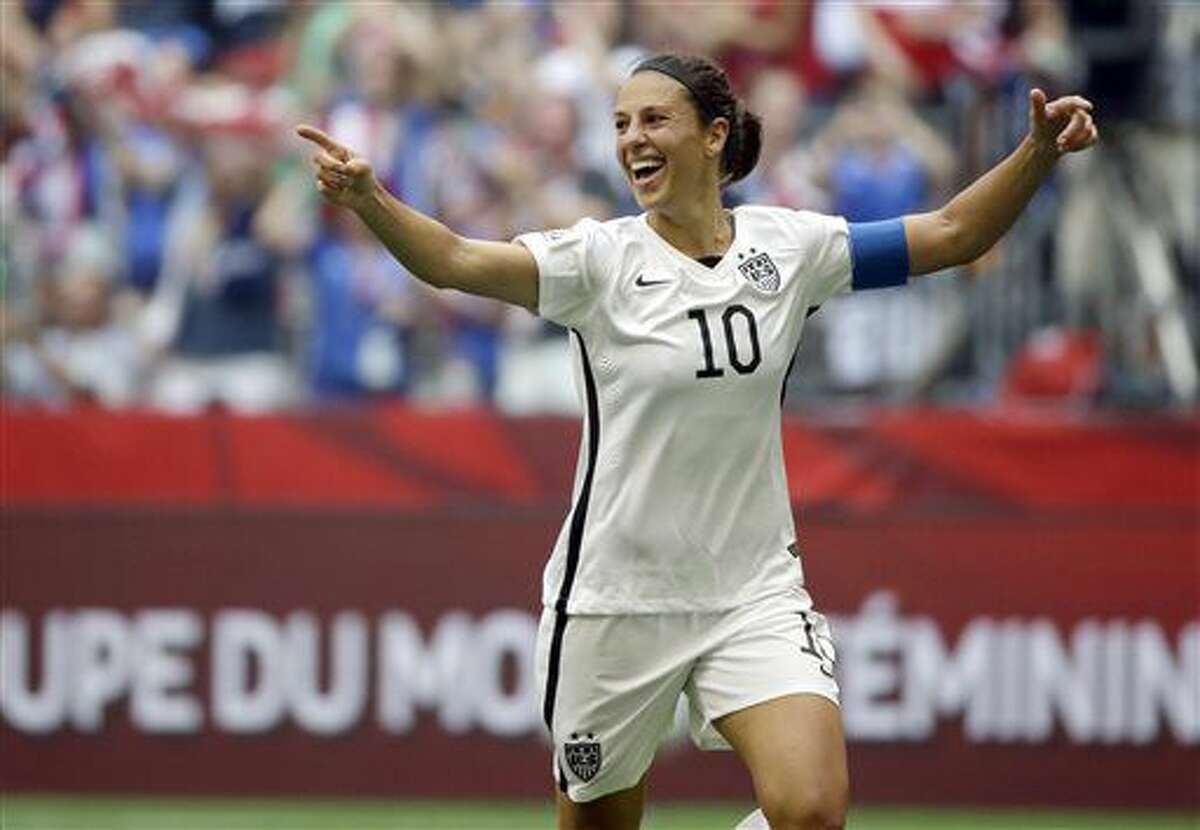 FILE - In this July 5, 2015, file photo, Carli Lloyd of the U.S celebrates scoring her third goal against Japan during the first half of the FIFA Women's World Cup soccer championship in Vancouver, British Columbia, Canada. Carli Lloyd says the time she's had to take to recover from a minor knee injury has been a blessing. It helped her slow down and reflect on a wild year. (AP Photo/Elaine Thompson, File)