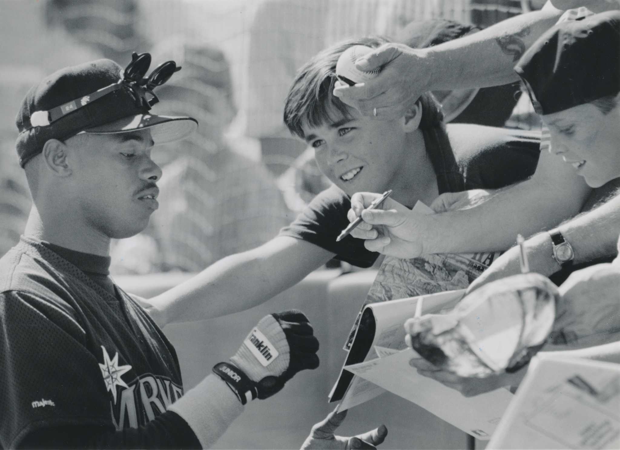 SI Photo Blog — Ken Griffey Jr. smiles from beneath a pile of