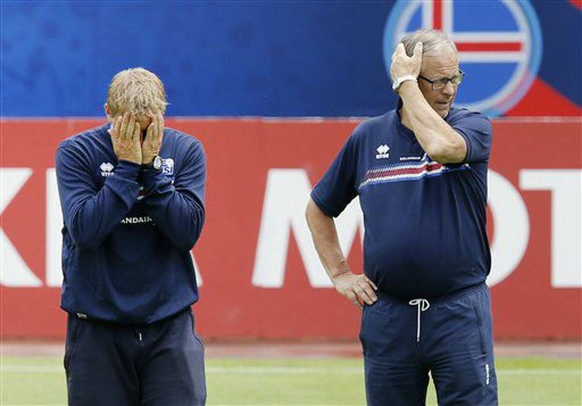 Coaches Lars Lagerbaeck, right, and Haimir Hallgrimsson attend a training session of Iceland's national soccer team at their base camp in Annecy, France, Thursday, June 30, 2016. Iceland will face France in a Euro 2016 quarterfinal match in Paris on Sunday, July 3, 2016.(AP Photo/Michael Probst)