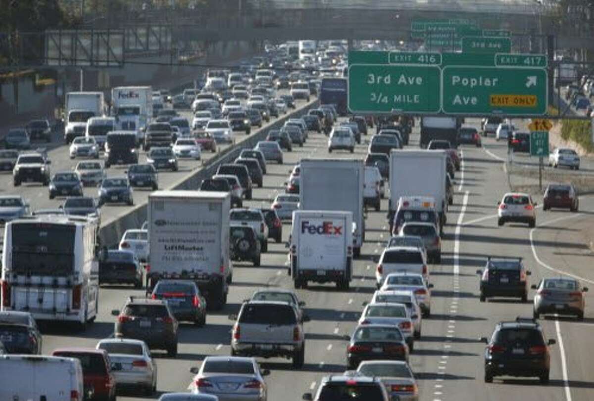 Traffic is congested in both directions during the peak morning commute on Highway 101 at the southbound Poplar Avenue exit in San Mateo, Calif. on Wednesday, July 13, 2016. Regional transit officials have gathered the necessary funding to begin work on a express lane project on the Bayshore Freeway through San Mateo County.