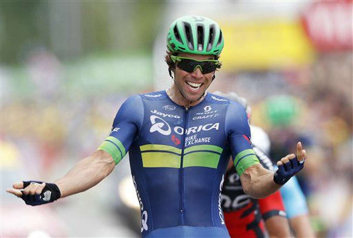 Australia’s Michael Matthews celebrates as he crosses the finish line to win the tenth stage of the Tour de France cycling race over 197 kilometers (122.4 miles) with start in Escaldes-Engordany, Andorra, and finish in Revel, France, Tuesday, July 12, 2016. (AP Photo/Christophe Ena)