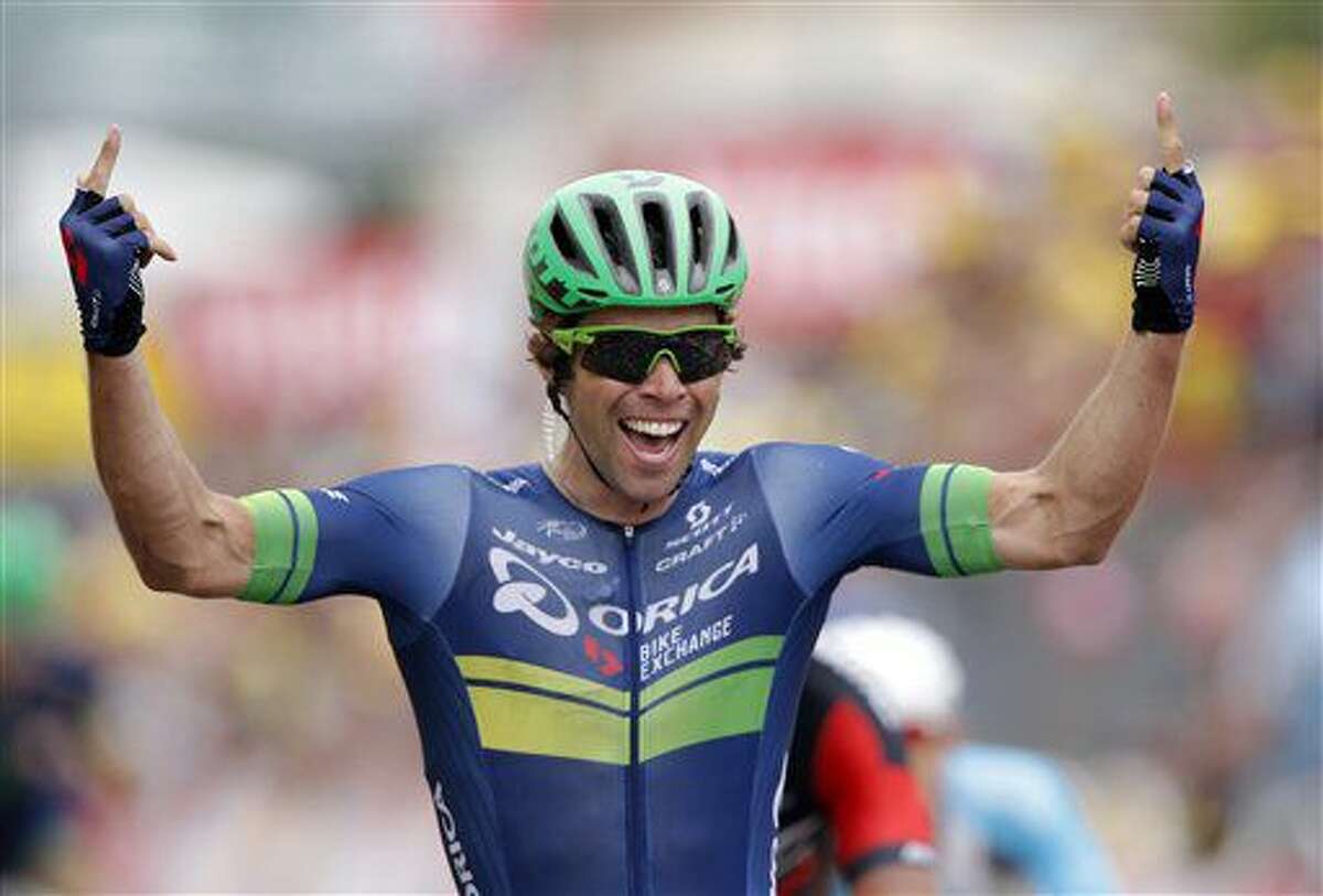 Australia’s Michael Matthews celebrates as he crosses the finish line to win the tenth stage of the Tour de France cycling race over 197 kilometers (122.4 miles) with start in Escaldes-Engordany, Andorra, and finish in Revel, France, Tuesday, July 12, 2016. (AP Photo/Christophe Ena)