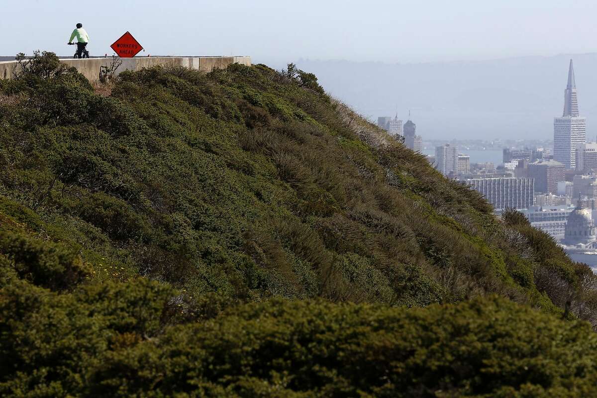 Jeffrey Perrone rides his bicycle at Twin Peaks in San Francisco, California, on Wednesday, July 13, 2016.