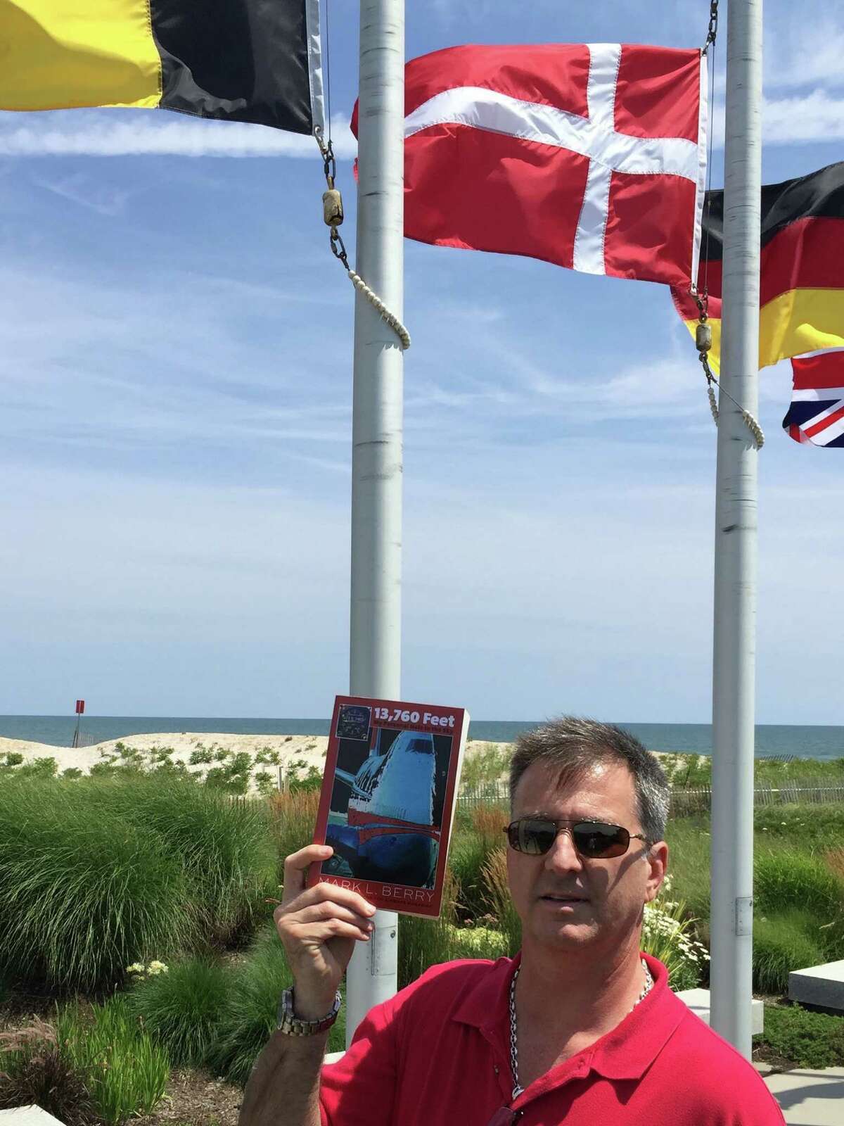 The title of Greenwich native Mark Berry's memoir "13,760 Feet," refers to the altitude of TWA Flight 800 which exploded off Long Island 19 years. Berry's fiance was on that flight.