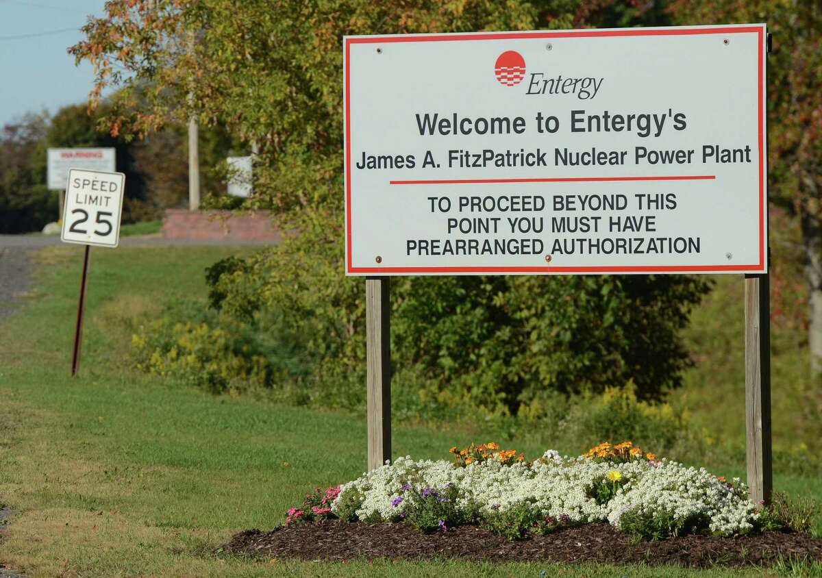 This Oct. 8, 2015 photo shows the sign to Entergy Corp. FitzPatrick nuclear plant in Scriba, N.Y. Negotiations to save the FitzPatrick nuclear power plant from closure by selling it to the operators of a nearby nuclear plant on Lake Ontario were proceeding Wednesday, July 13, 2016. Exelon said it was in discussions to purchase Entergy Corp.?’s FitzPatrick plant, which employs more than 600 people and produces enough electricity to power more than 800,000 homes. (Stephen D. Cannerelli/The Syracuse Newspapers via AP) ORG XMIT: NYSYR101