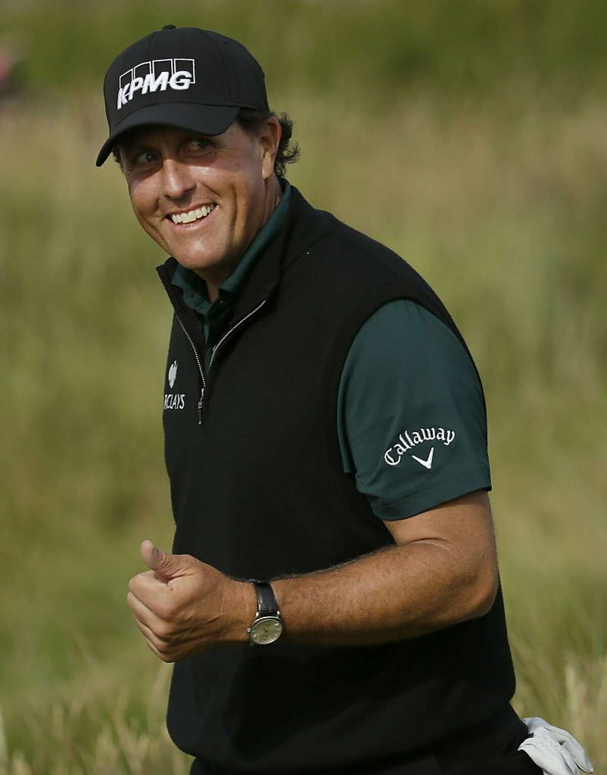 Mickelson matches major record with 63 at British Open