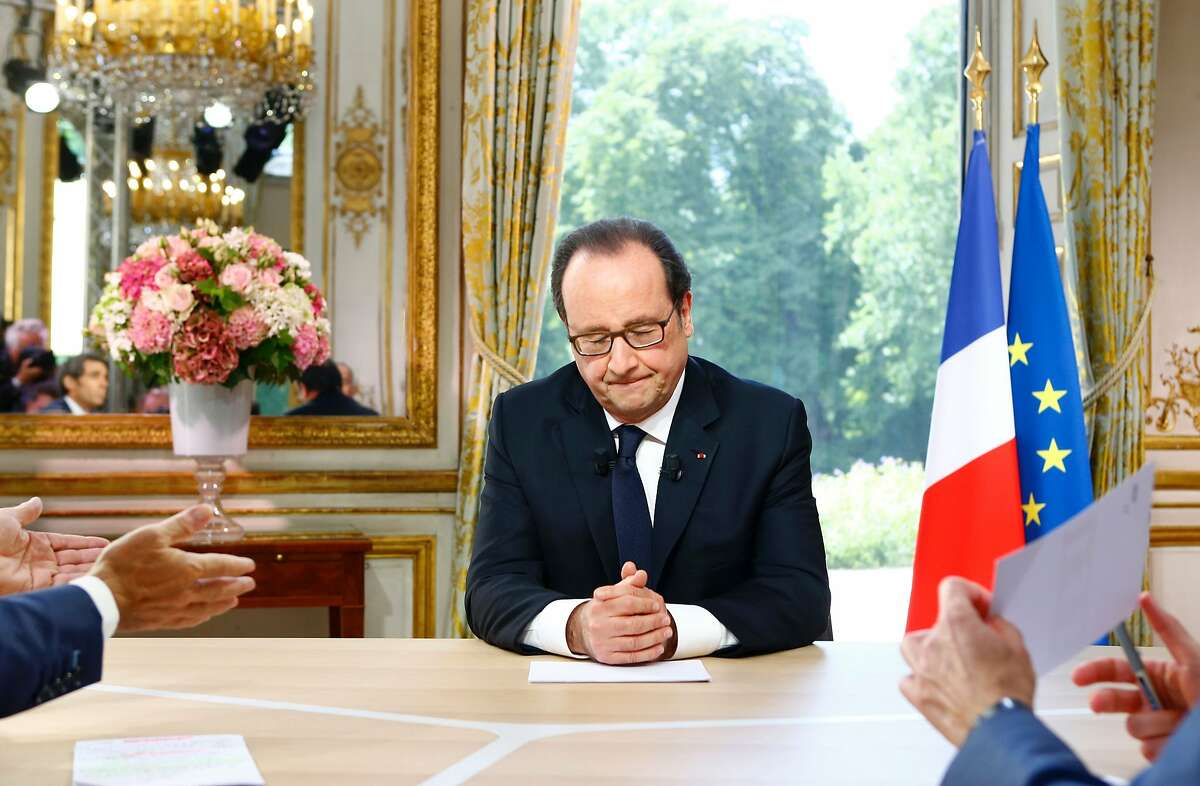 TOPSHOT - French President Francois Hollande reacts during a televised interview following the Bastille Day Parade in Paris, on July 14, 2016. / AFP PHOTO / POOL / Francois MoriFRANCOIS MORI/AFP/Getty Images
