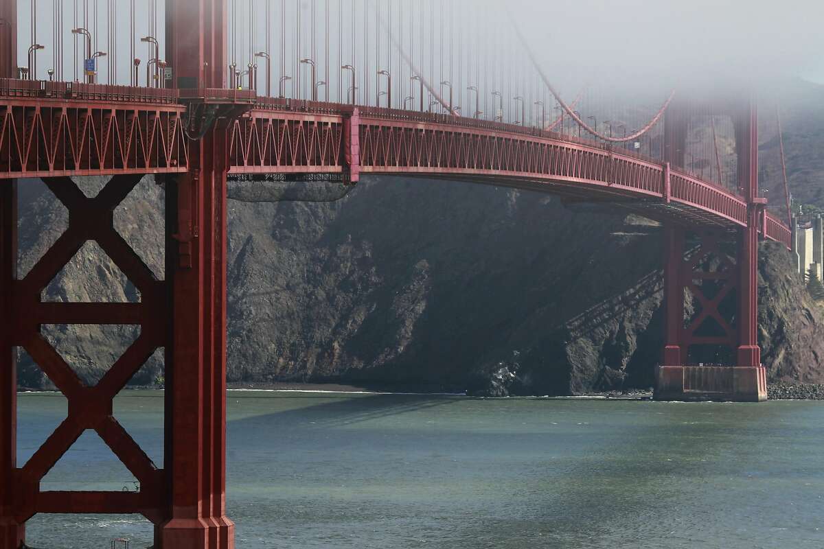 FILE-- The Golden Gate Bridge District board of directors voted unanimously in favor of erecting a suicide barrier on the iconic bridge in San Francisco, Calif. on Friday, June 27, 2014, after listening to comments from family members who lost loved ones that jumped from the span.