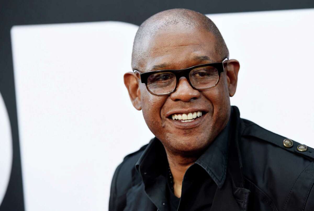 FILE - In this Monday, June 8, 2015, file photo, Forest Whitaker, producer of "Dope," arrives at the premiere of the film at the Los Angeles Film Festival in Los Angeles. Whitaker and Anika Noni Rose are joining the cast of A&E Networks' "Roots" miniseries remake. Others in the cast will include Anna Paquin, Jonathan Rhys Meyers and newcomer Malachi Kirby as the central figure Kunta Kinte, A&E said Wednesday, Sept. 16. (Photo by Chris Pizzello/Invision/AP, File) ORG XMIT: NYET362
