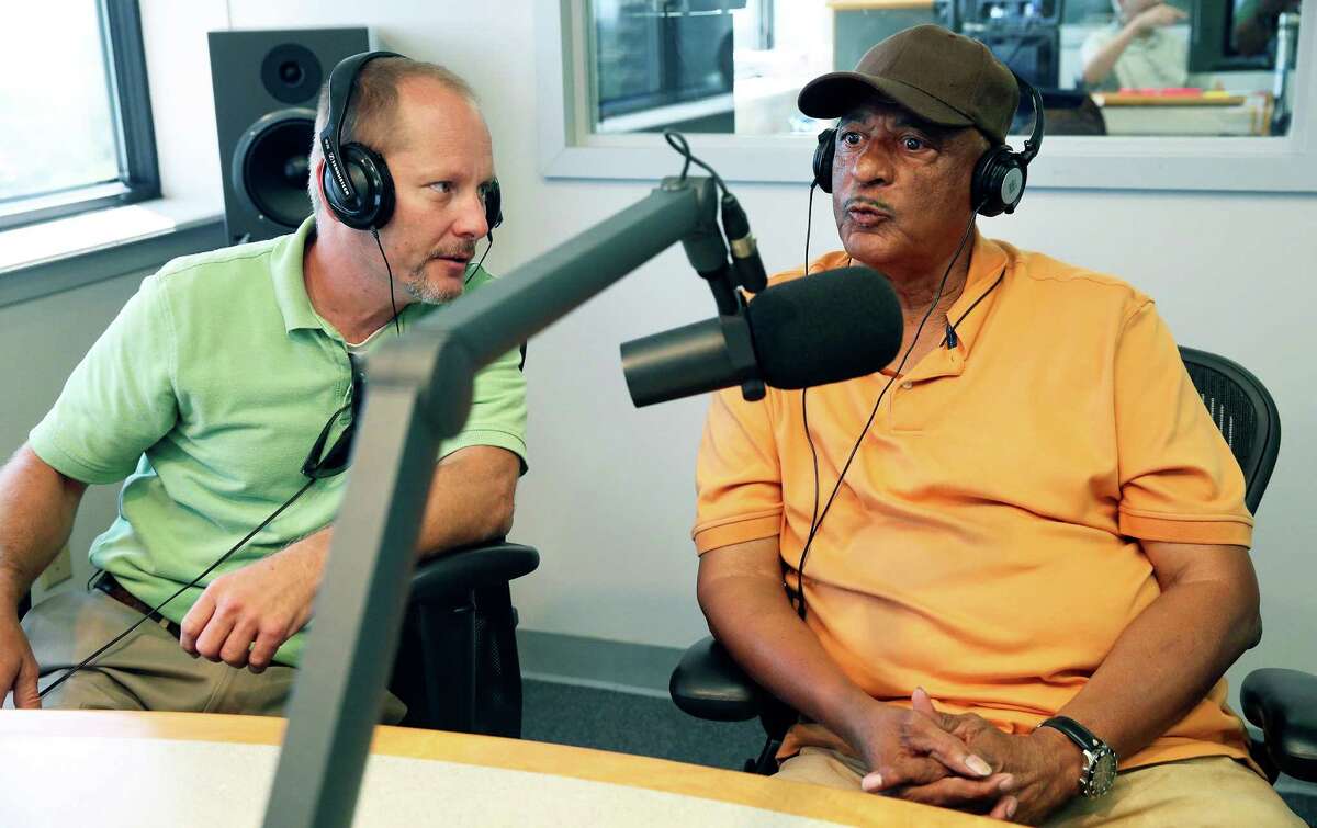 Former baseball player Lawrence "Dittney" Johnson (right) chats with Greg Garrett from the Institute of Texan Cultures as they are interviewed in the studios of Texas Public Radio on July 14, 2016.