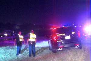 Man hospitalized after truck crashes into car, rolls, catches fire on Loop 410