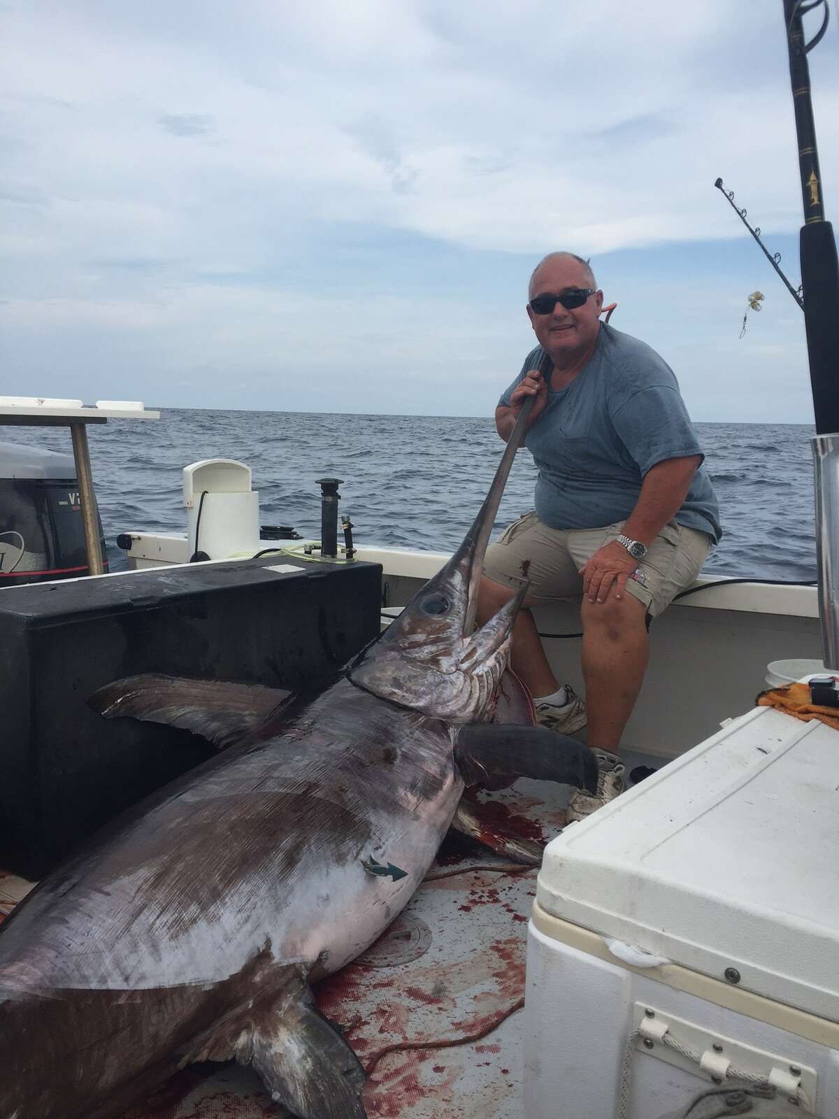 Emil J. Krejci Jr., 54, set a new state record with his 412-pound, 97-inch swordfish catch June 29 when he was fishing in the Gulf of Mexico.