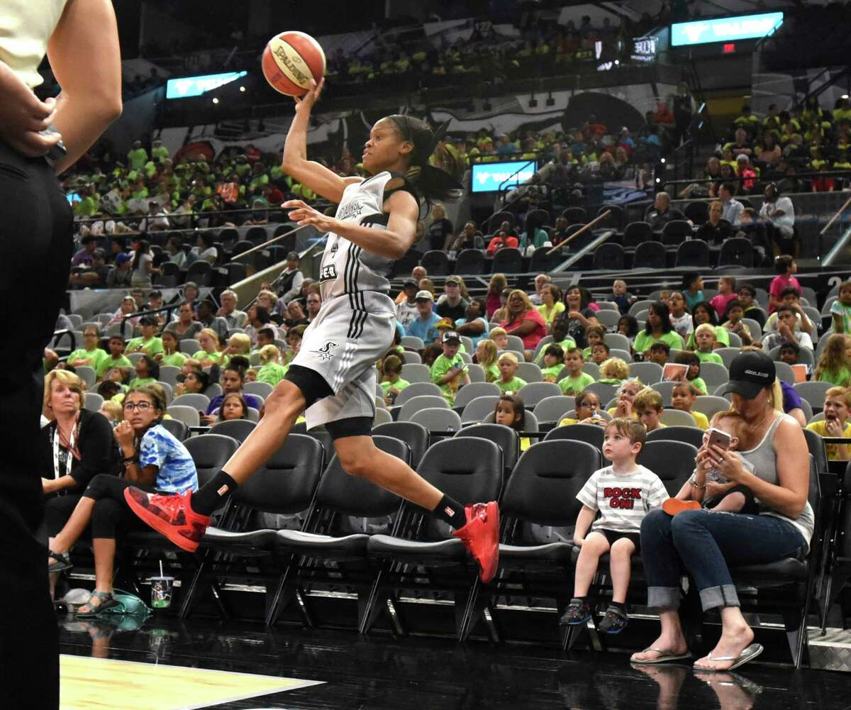 San Antonio Stars' Moriah Jefferson saves the ball from going out of bounds during a WNBA basketball game against the Minnesota Lynx in the AT&T Center, Tuesday, July 12, 2016, in San Antonio. The Lynx won 81-57. (Billy Calzada/The San Antonio Express-News via AP)