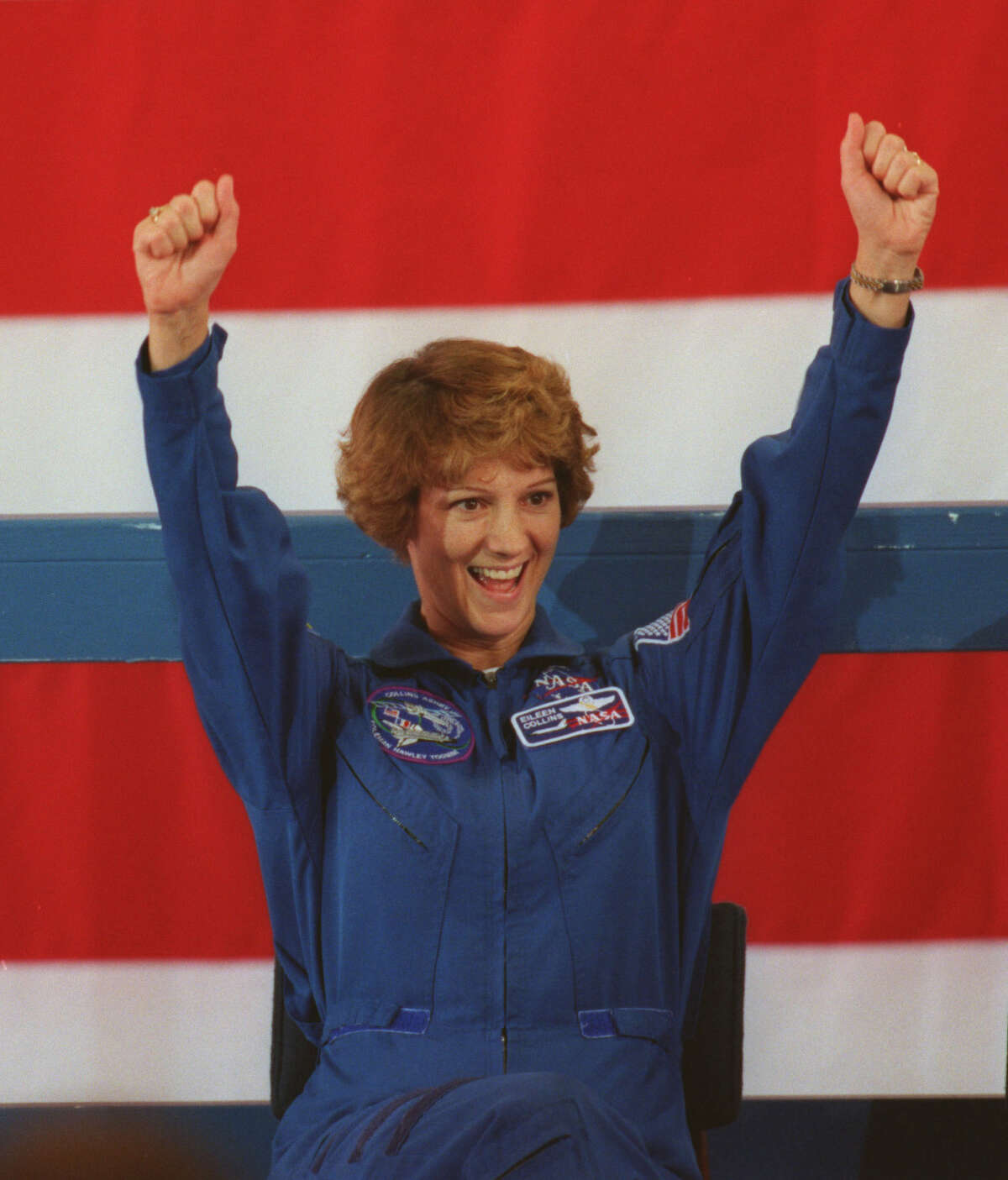 Air Force Col. Eileen Collins, the first female shuttle commander, responds to well-wishers at her welcome-home ceremony in 1999 at Ellington Field. Collins drew praise from NASA officials for guiding her colleagues through difficulties.