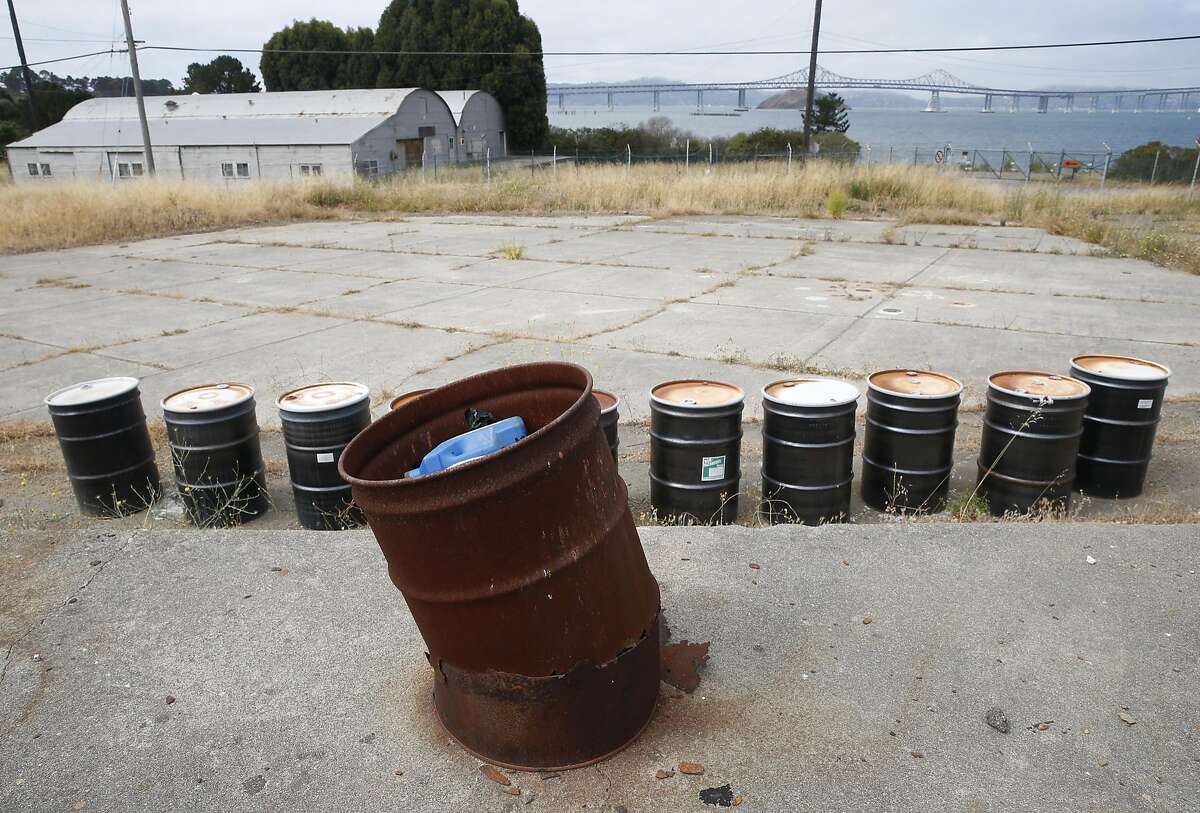 Empty 55-gallon drums remain on an abandoned Navy storage yard, where a developer hopes to build new homes, at Point Molate in Richmond, Calif. on Friday, July 15, 2016. Residents and environmentalists are not happy with a plan by the city's mayor to hand over prime real estate to the developer of a failed casino project at the same location.