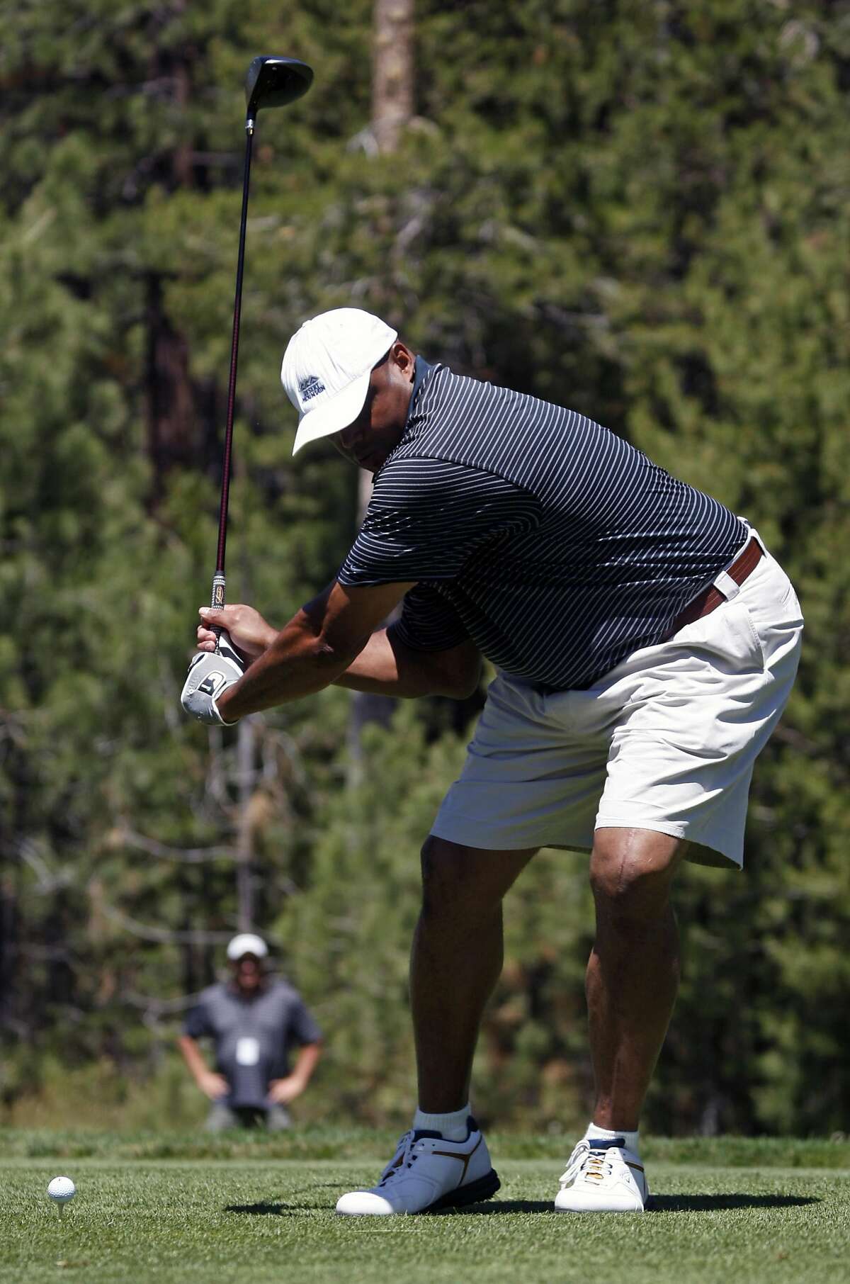 Charles Barkley, basketball Hall of Famer, NBA broadcaster, tees off on 18th at the 20th annual Celebrity Pro-Am American Century Championship at Edgewood Tahoe Golf Course. Thursday July 16, 2009