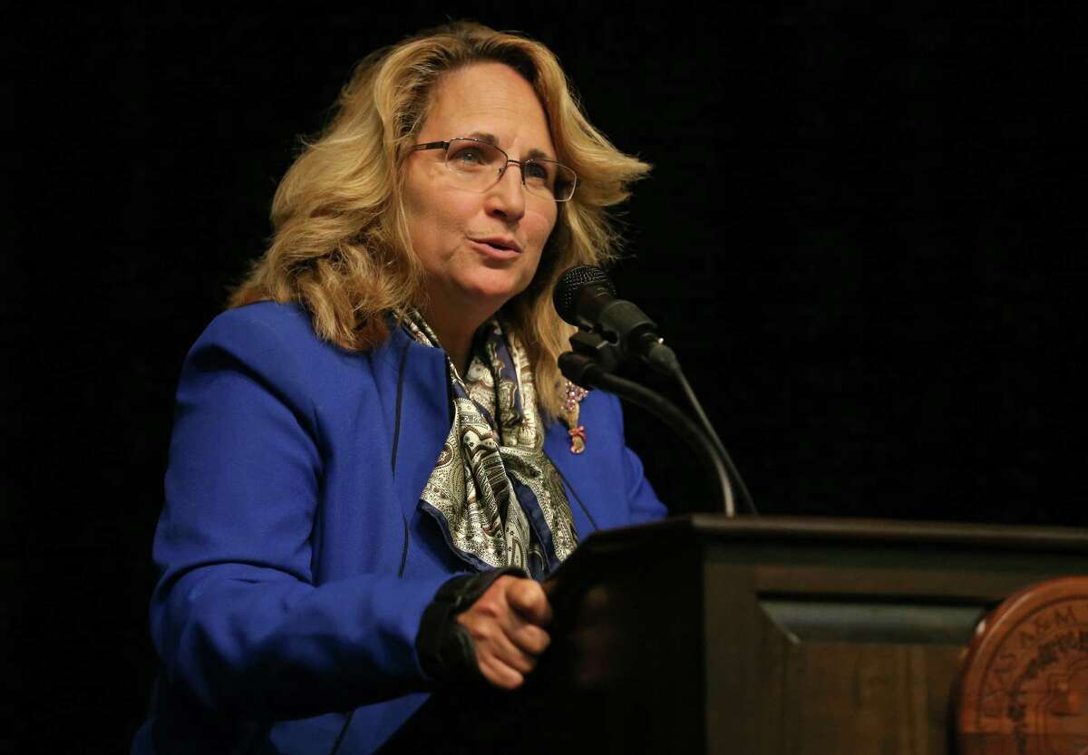 Mary Beth Fisk, CEO/Executive Director of The Ecumenical Center, speaks during the Chaplains for Justice achievement ceremony for the inaugural class of the Chaplains for Justice Training Program held Monday July 11, 2016 at Texas A&M University San Antonio. The 14-week accredited program, which was developed and administered by the Ecumenical Center, is designed to give chaplains in law enforcement the same tools and training required to support law enforcement personnel and other first responders dealing with grief, tragedy, PTSD and other issues faced in the line of duty.