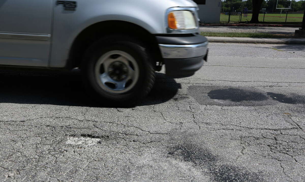 A pothole filled in January by Mayor Sylvester Turner at 9733 Neuens Road held up, as seen on July 7. A new report has found Houston's roads are better than many of its big city peers.