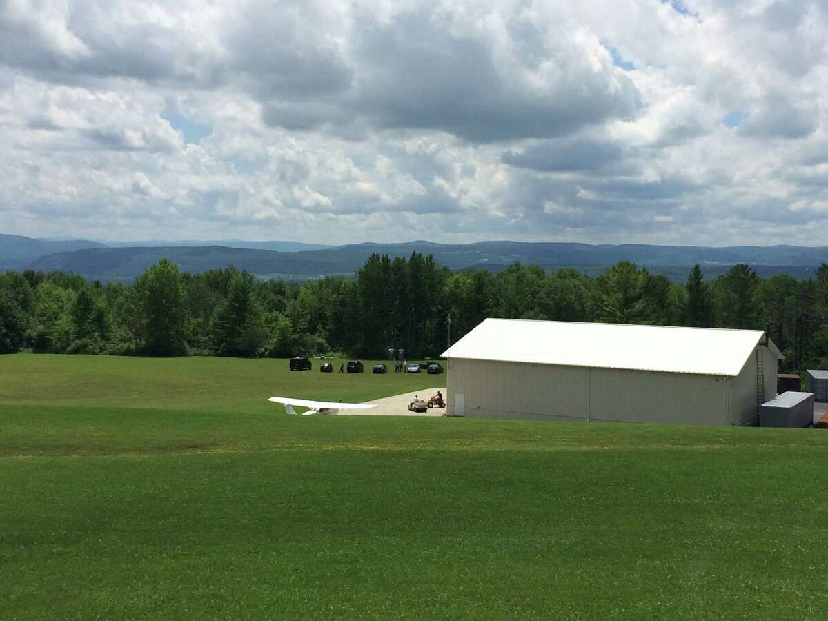 A hangar at the Hogan Airport, a private air strip, in the Town of Esperance, Schoharie County where a plane flew 1,000 feet before crashing into woods just behind the hangar July 16, 2016. Three people were killed. (Lauren Stanforth)