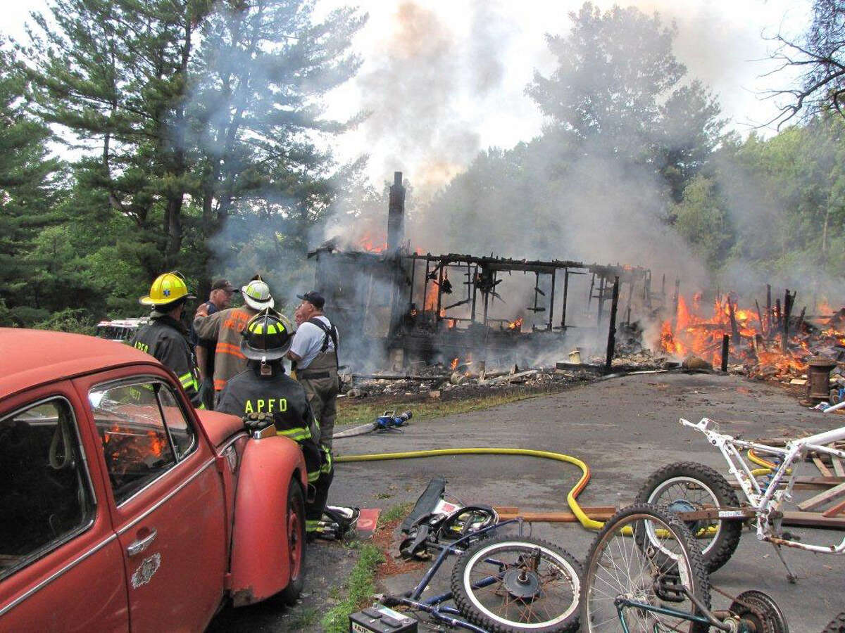 An intense fire destroyed the home of five people Sunday morning, July 17, 2016, in Poestenkill, Assistant Fire Chief David Basle of the Poestenkill Fire Department said. (Martin E. Miller photo)