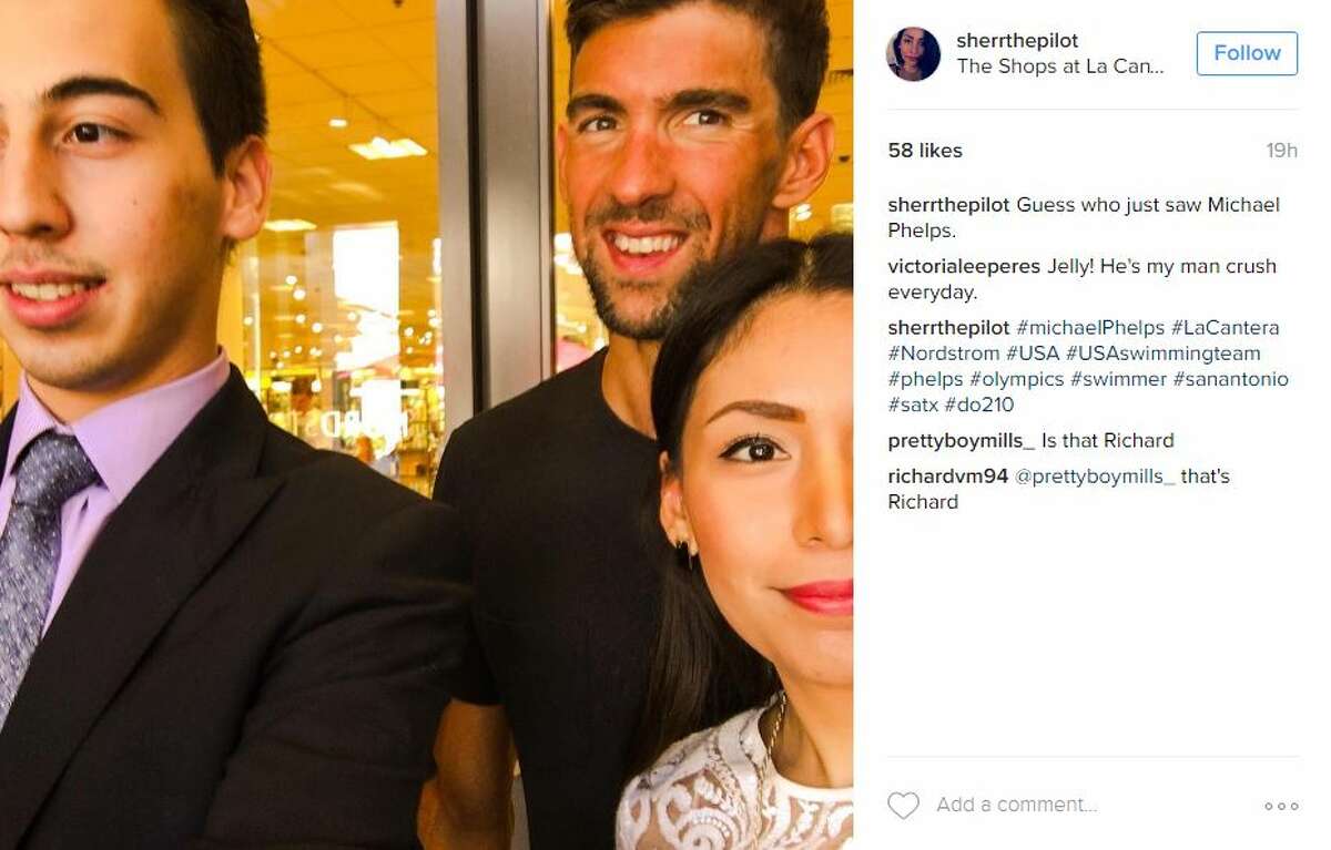 Instagram user @sherrthepilot snapped this photo with Michael Phelps while shopping at La Cantera.