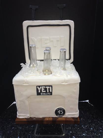 Yeti Cooler shaped grooms cake with cans and logos