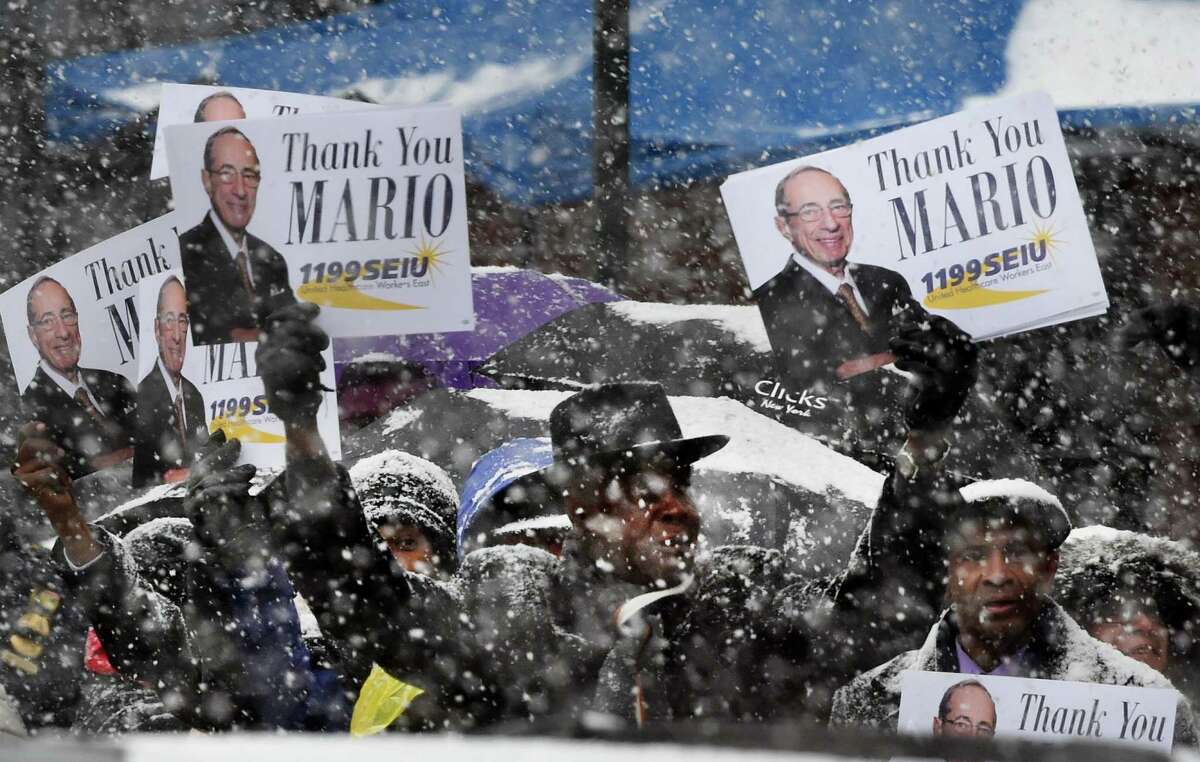 Members of 1199 SEIU show their gratitude at funeral of former Governor Mario M. Cuomo on Tuesday morning, Jan. 6, 2015, at St. Ignatius Loyola Church in New York. (Skip Dickstein/Times Union archive)