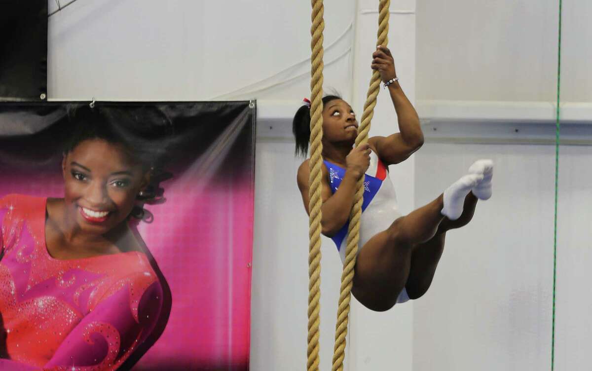 Olympic gymnast Simone Biles works out at the World Champions Centre before leaving to Rio Friday, July 15, 2016, in Spring.