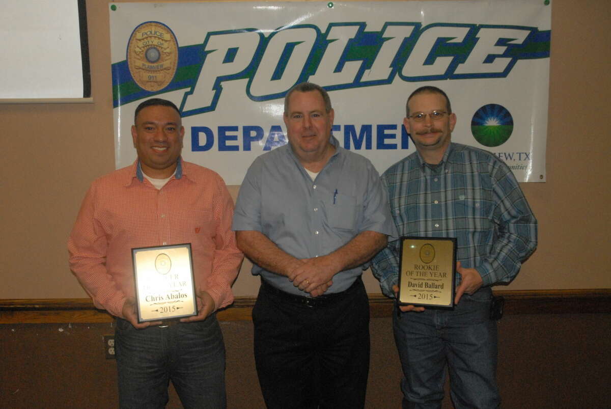 Earning the 2015 Officer of the Year Award at Friday's annual Police Banquet was peace officer Chris Abalos (left), who has served with the Plainview Police Department for the last four years. Police Chief Ken Coughlin (center) presented Plainview's Rookie of the Year award to officer David Ballard.